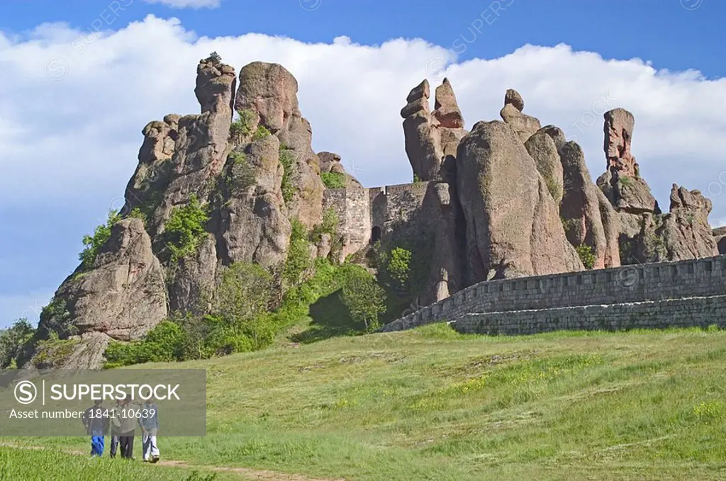 Tourists with castle on hill, Belogradchik Fortress, Belogradchik, Vidin, Romania