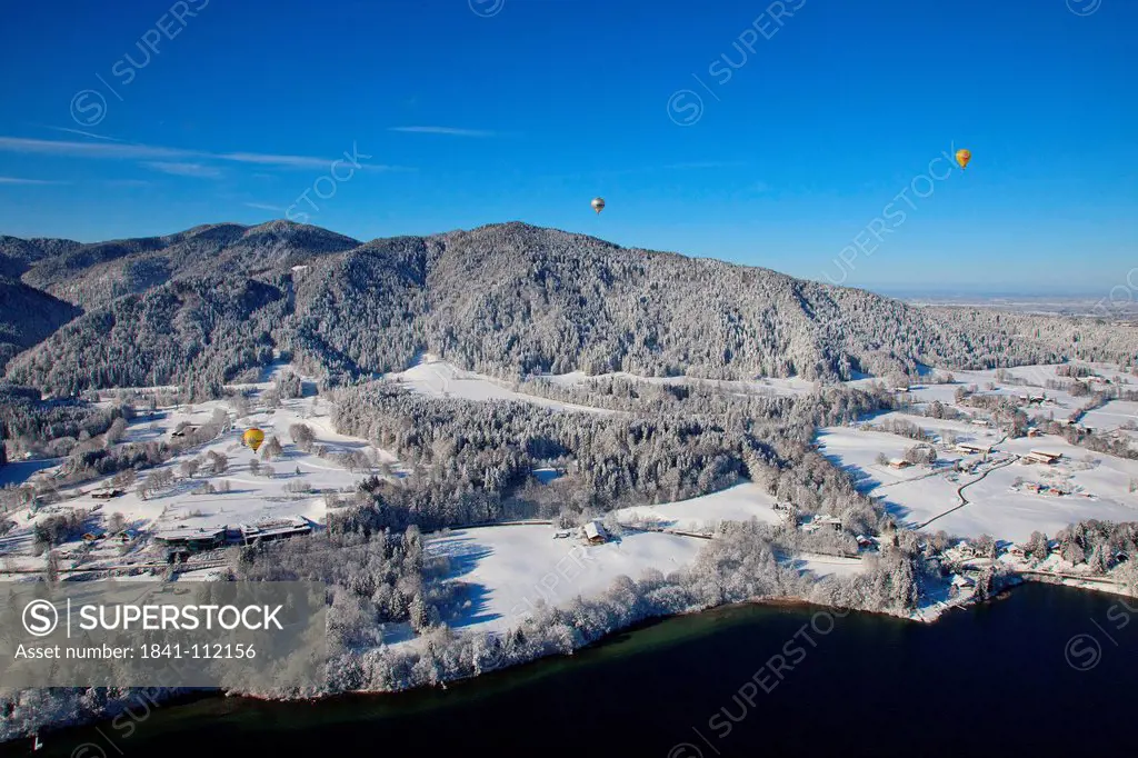 Hot_air balloons above Tegernsee Valley, Bavaria, Germany, aerial shot