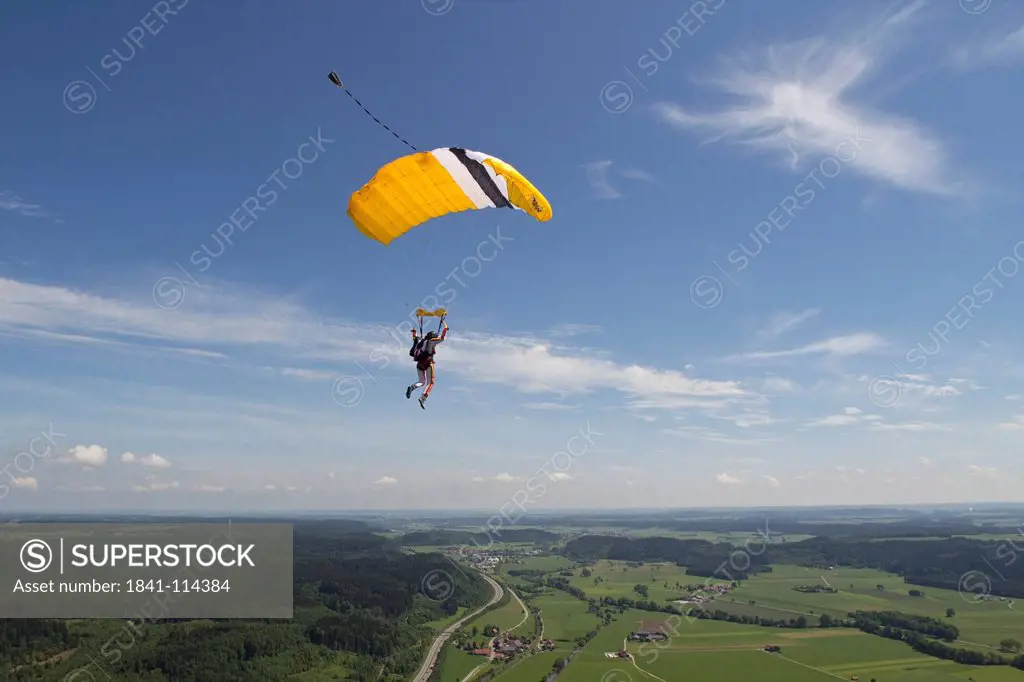 Female skydiver in the air