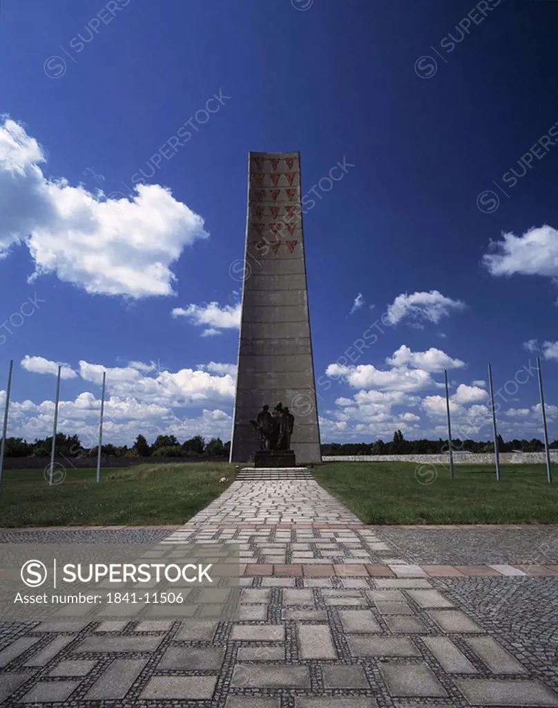 Path leading to monument against cloudy sky, Brandenburg, Germany