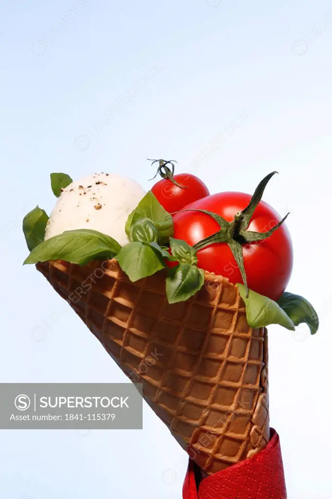Ice cream cone with tomato and Mozzarella