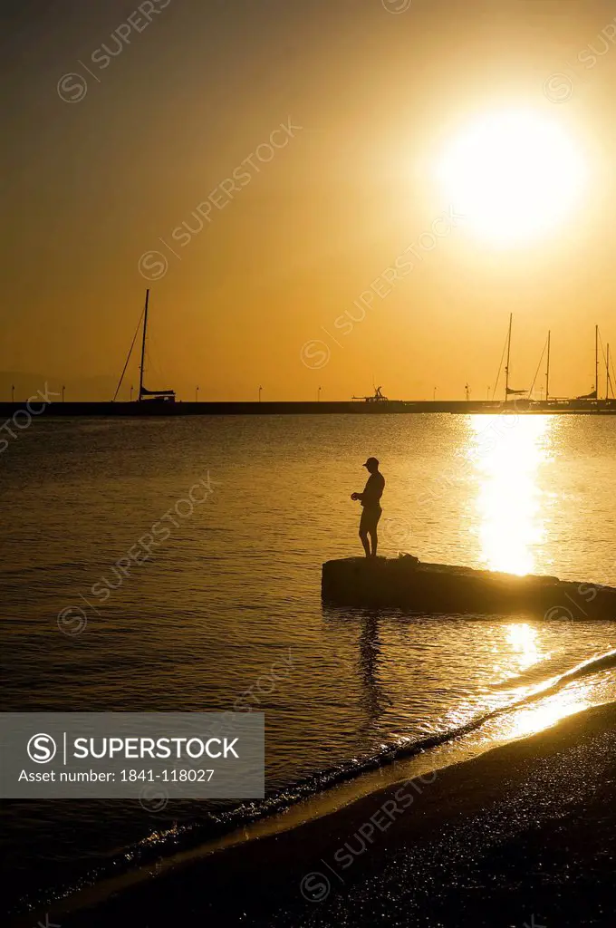 Fisherman in harbour, Kos, Dodecanes, Greece, Europe