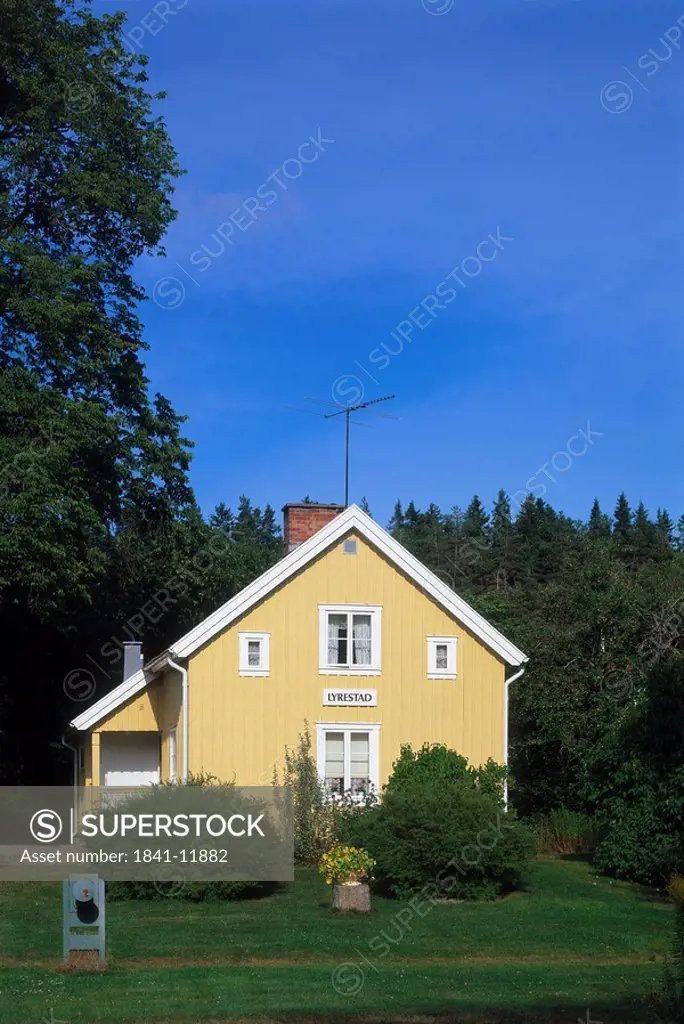 Wooden house in village, Lyrestad, Mariestad, Vastra Gotaland County, Sweden