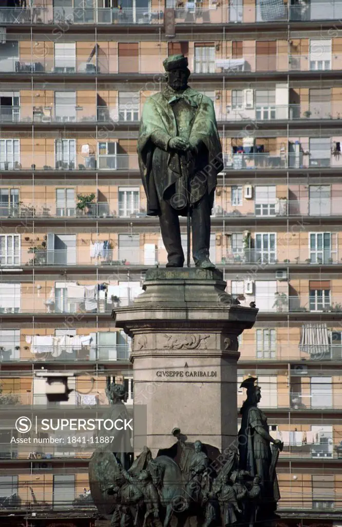 Monument of Giuseppe Garibaldi in front of building, Naples, Campania, Italy