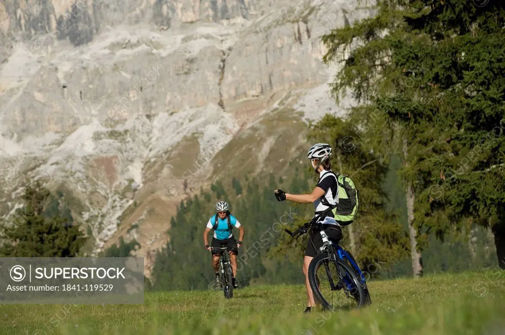 Two mountainbikers in the Dolomites, South Tyrol, Italy