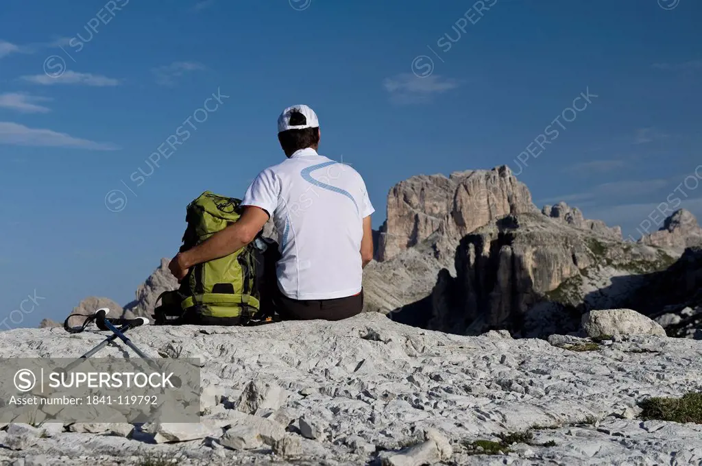 Hiker in front of Tre Cime di Lavaredo, Dolomites, South Tyrol, Italy