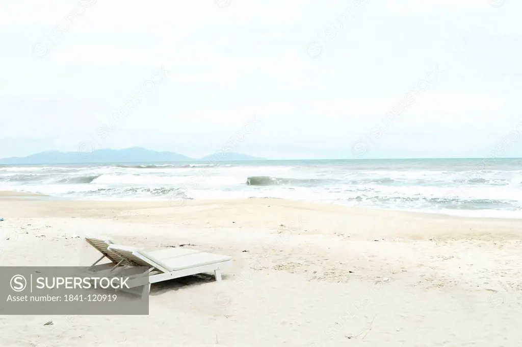 Two sun loungers at beach, South Chinese Ocean, Mui Ne, Vietnam, Asia
