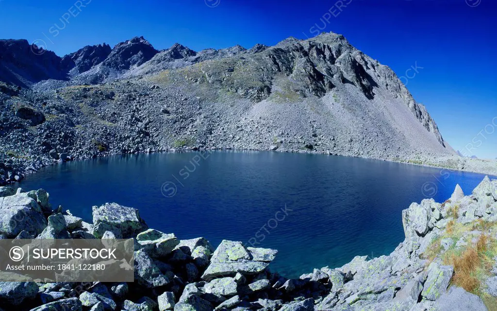 Mountain lake Goldsee in Nauders, Tyrol, Austria