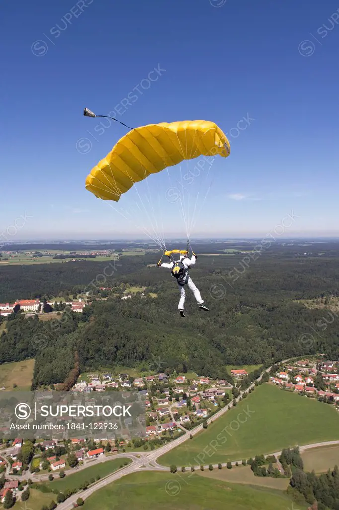 Parachutist in the air, Bavaria, Germany