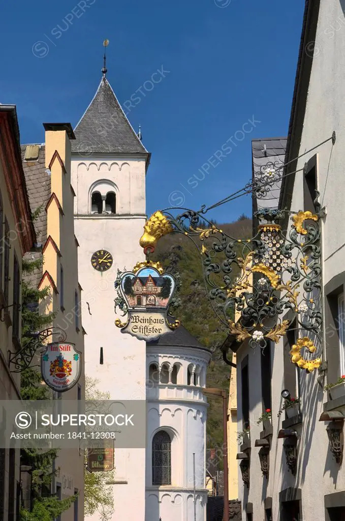 Inn sign in front of the St. Castor Abbey Church, Treis_Karden, Rhineland_Palatinate, Germany
