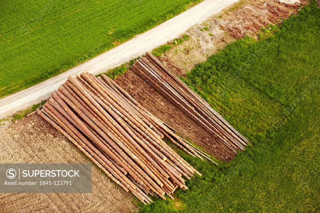 Stored logs at a path, aerial photo