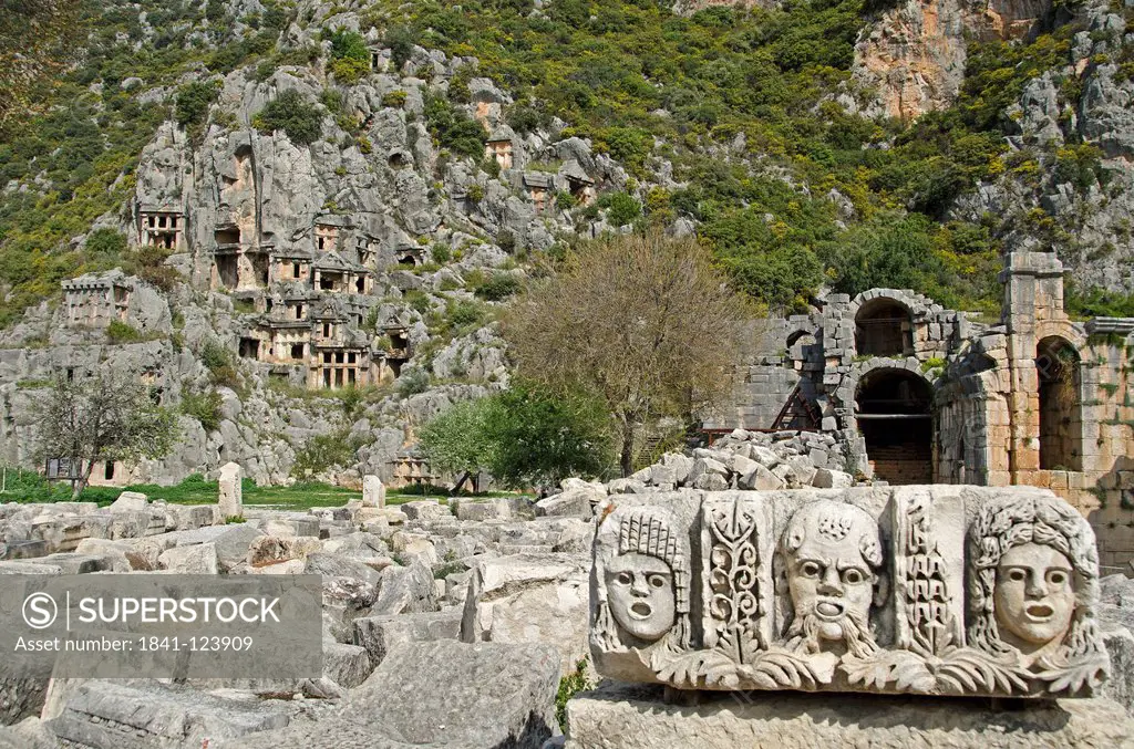 Rock tombs and theater masks made of stone in Myra, Turkey