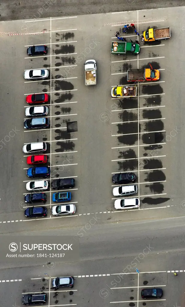 Parking lot with cars, aerial photo