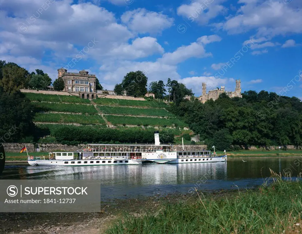Tourists on tour boat in river, Elbe River, Dresden, Germany