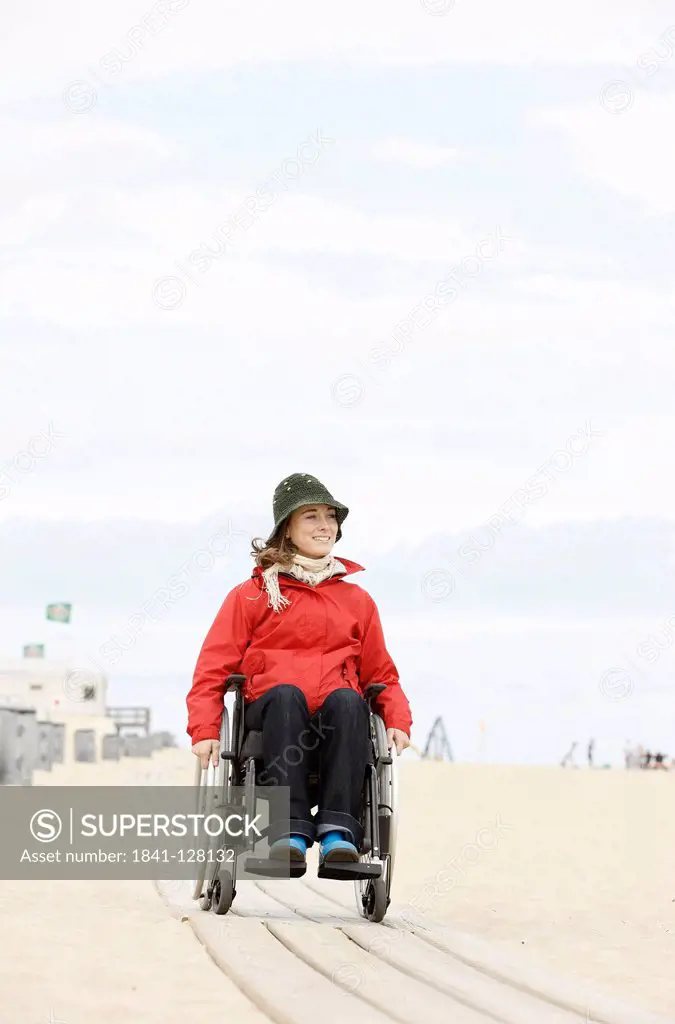 Female Wheelchair User on the Beach