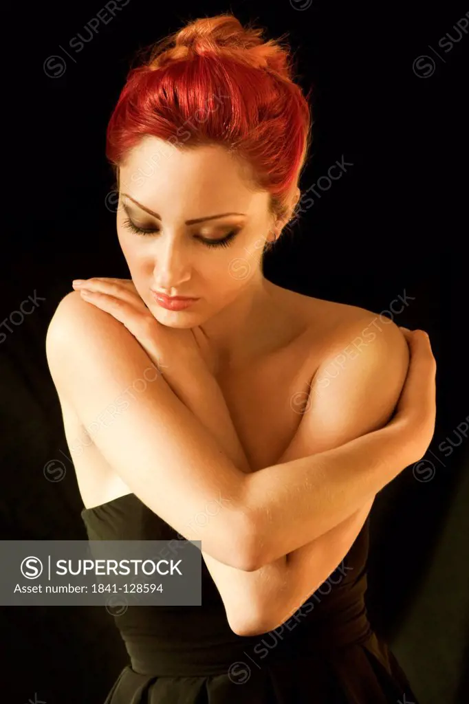 Attractive red-haired young woman