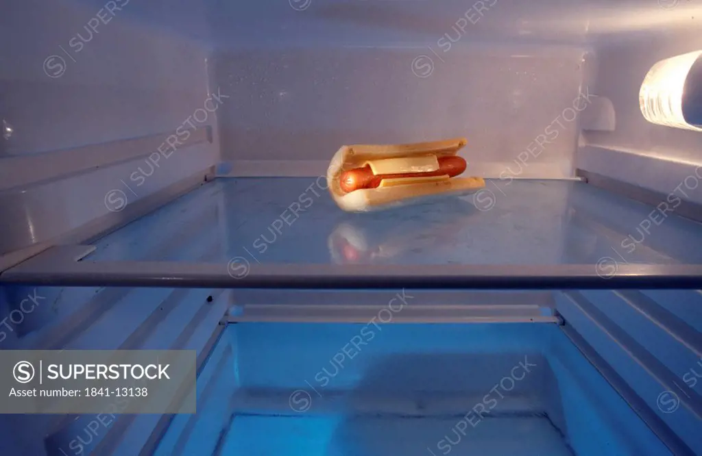 Close_up of a hot dog in a refrigerator
