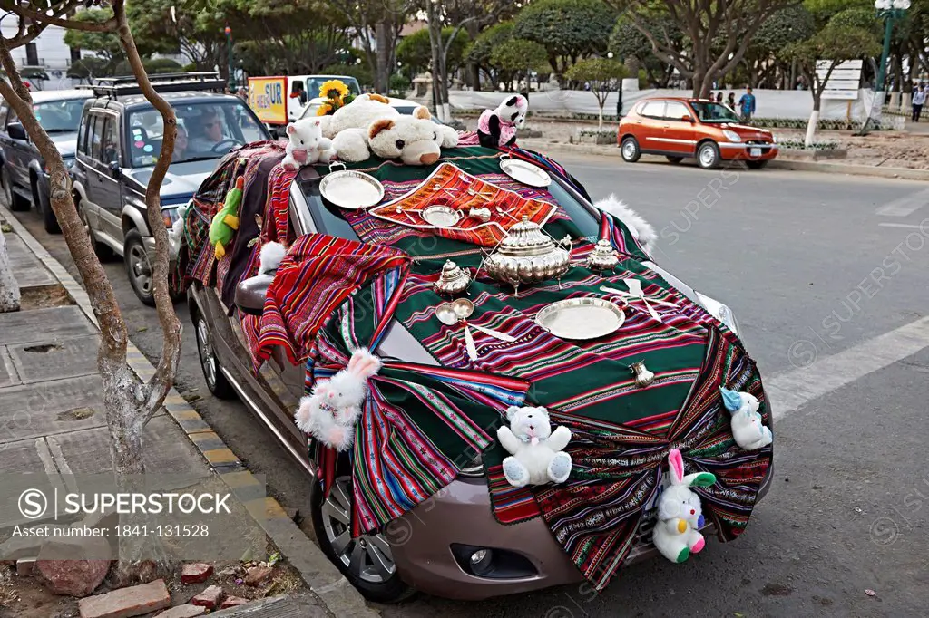 Headline: Car decorated for a religious rite in Sucre, Bolivia