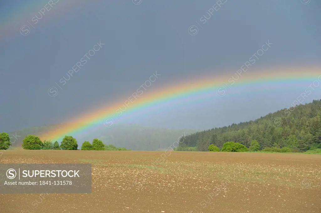 Headline: Landscape of a rainbow in Upper Palatinate, Bavaria, Germany