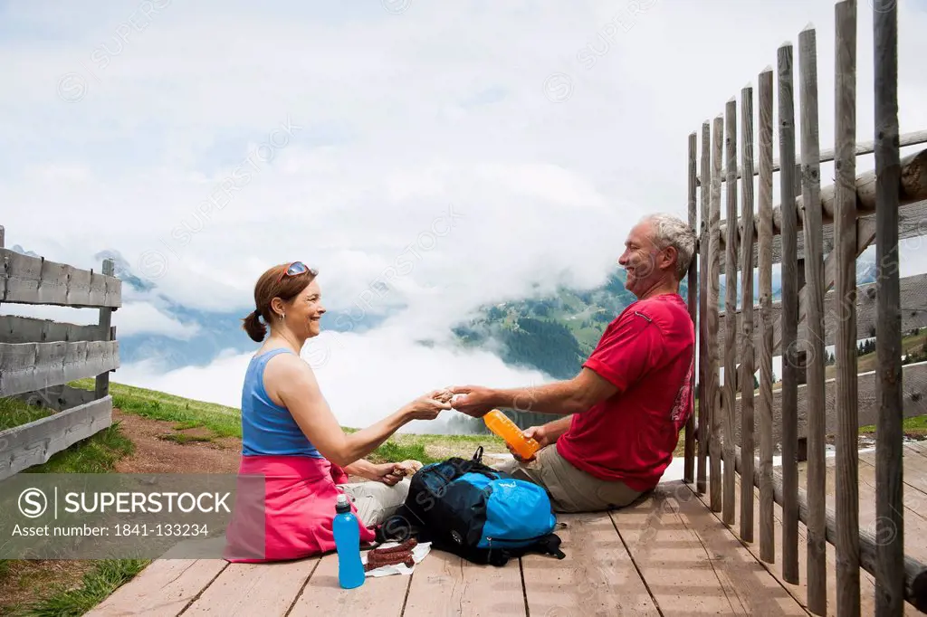 Couple having a break, Neunerkoepfle, Allgaeu Alps, Tannheim Valley, Tyrol, Austria, Europe