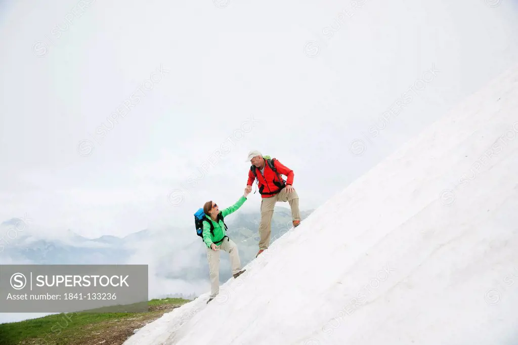 Couple hiking, Neunerkoepfle, Allgaeu Alps, Tannheim Valley, Tyrol, Austria, Europe