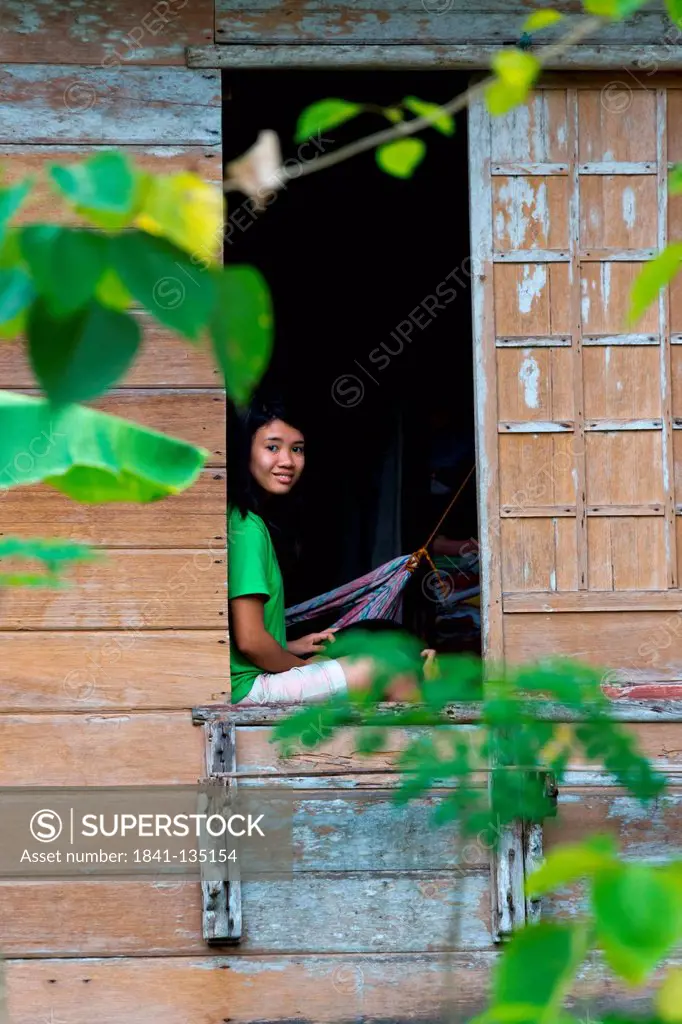 Girl in a window, Bohol, Philippines