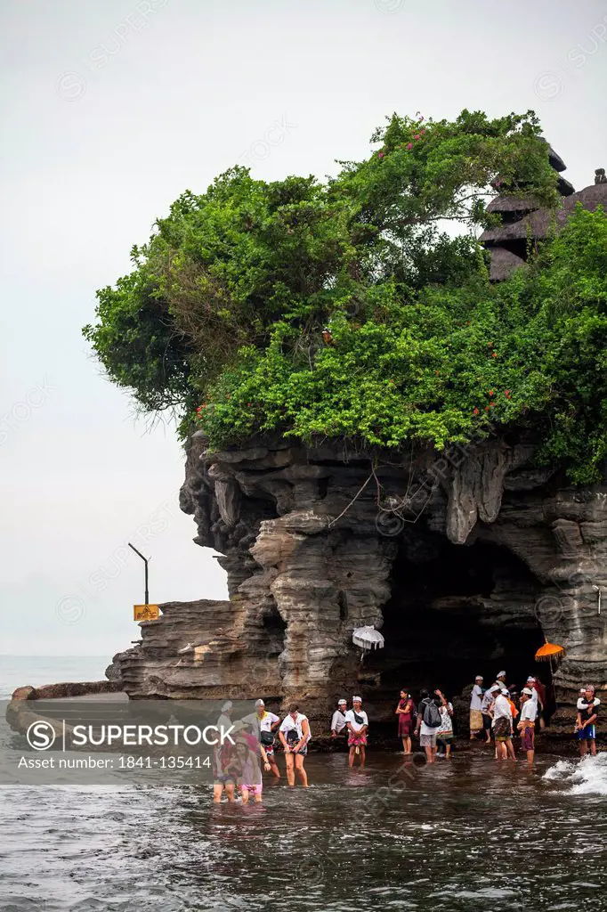 Tourists returning from the Temple Pura Tanah Lot on Bali, Indonesia