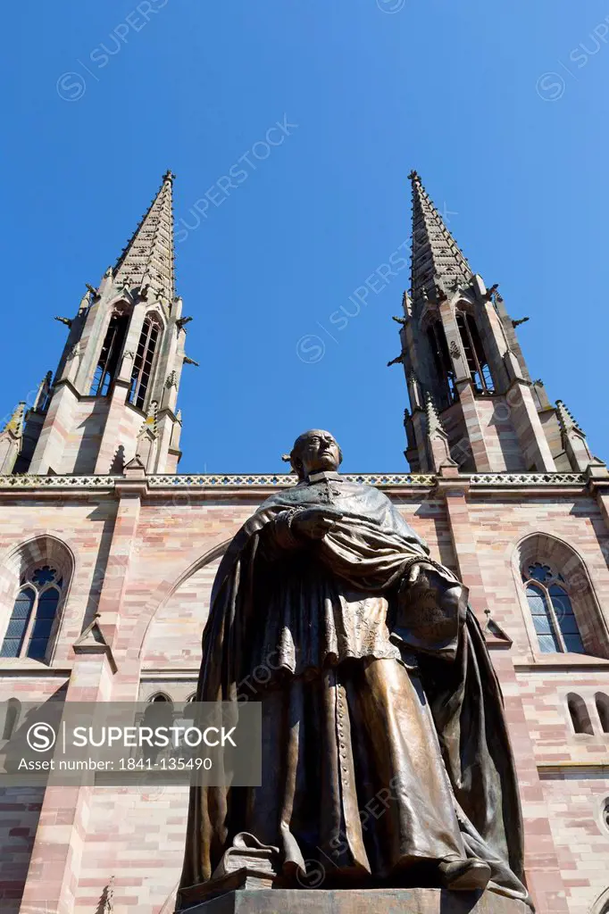 Statue of Monseigneur Freppel in Front of the Church Saints Pierre et Paul in Obernai, Alsace, France