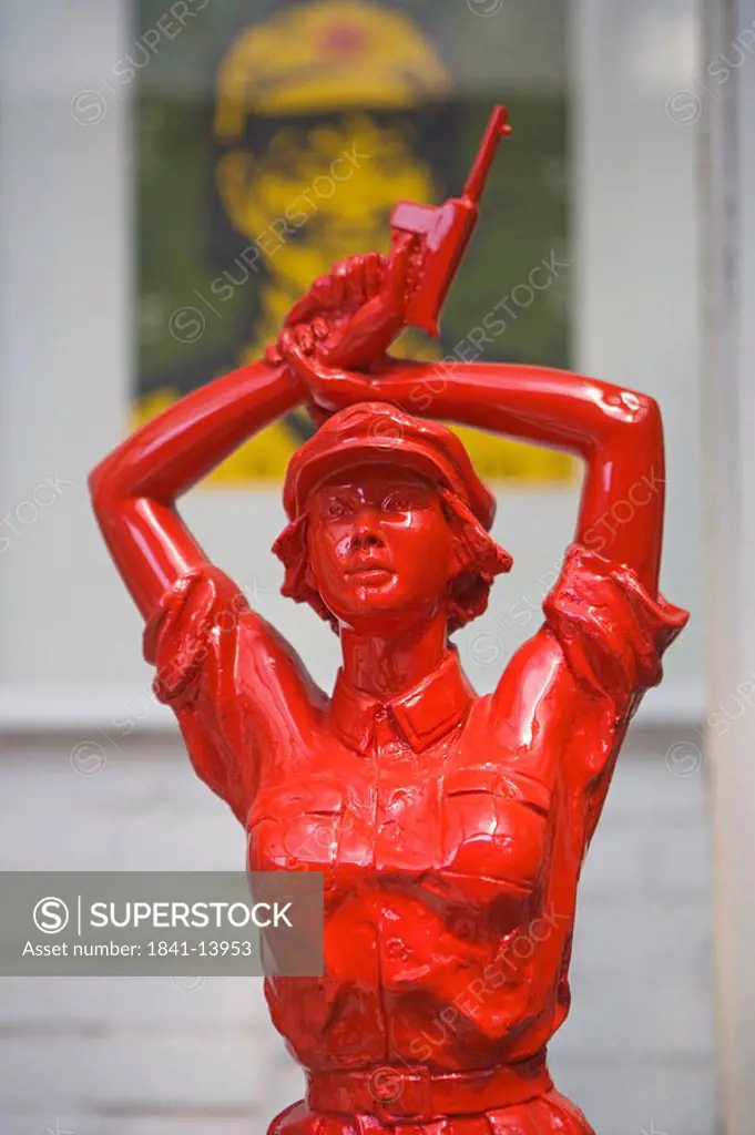 Sculpture of woman with gun, Beijing, China