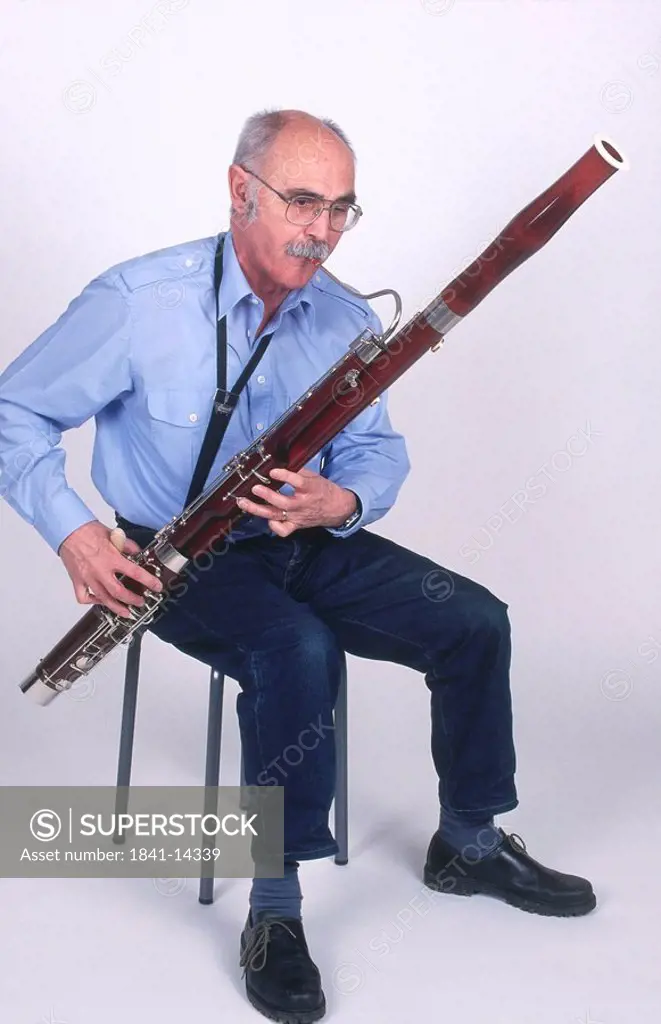 Senior man playing bassoon