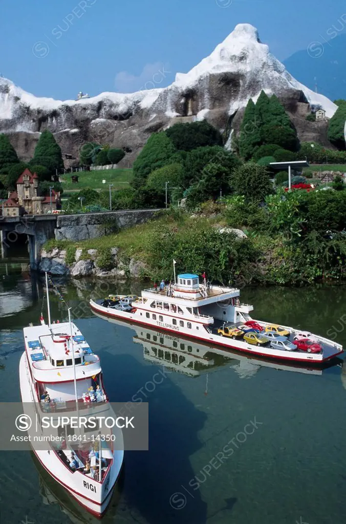 Model ships in river at pleasure park, Swissminiatur, Melide, Tessin, Switzerland