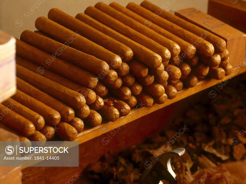 Stack of cigars on wooden slab, Panama