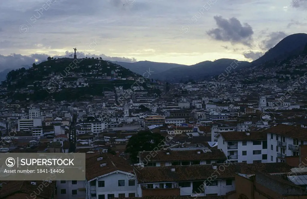 High angle view of city at dusk, Quito, Ecuador