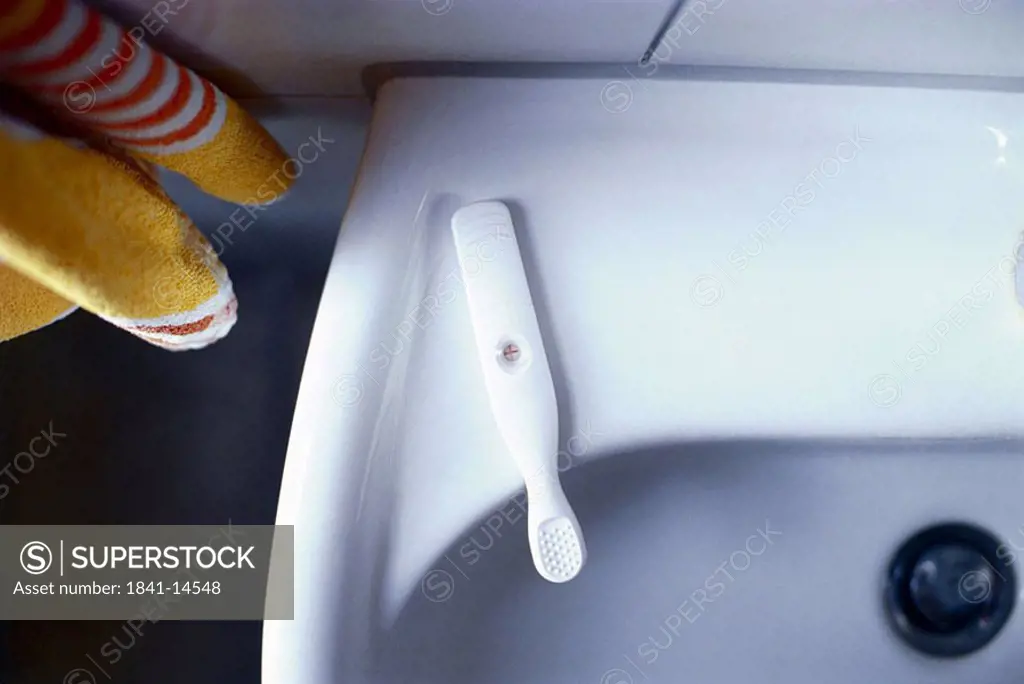 High angle view of pregnancy test at washbasin
