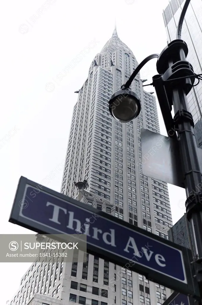 Street sign of the Third Avenue in front of the Chrysler Building, New York City, USA, worm´s_eye view