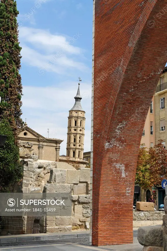 Ruins of a roman city wall, San Juan de los Panetes Church in the background, Zaragoza, Spain