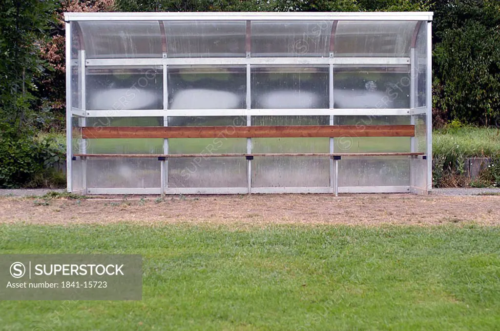 Empty bench in soccer ground