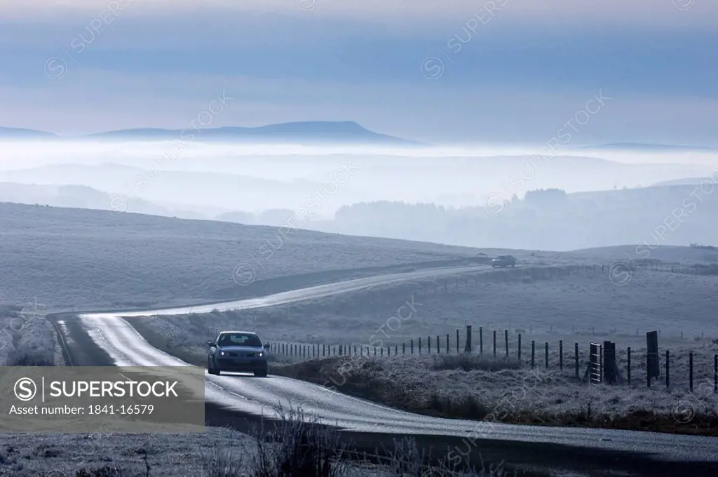 Cars on country road, Brecon Beacons National Park, Great Britain, Wales, Powys
