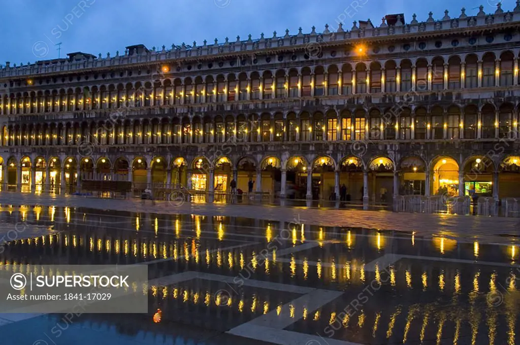 Building lit up at dusk, Procuratie, St Mark´s Square, Venice, Veneto, Italy