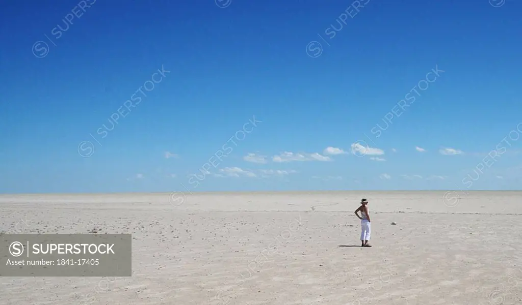 Woman standing in desert