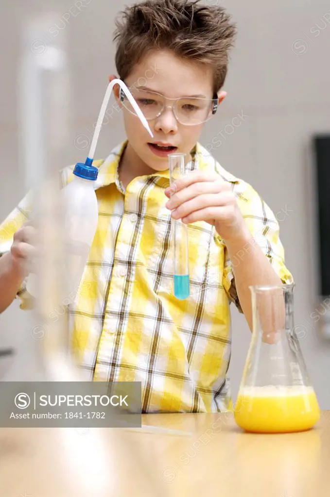 Boy doing science experiments