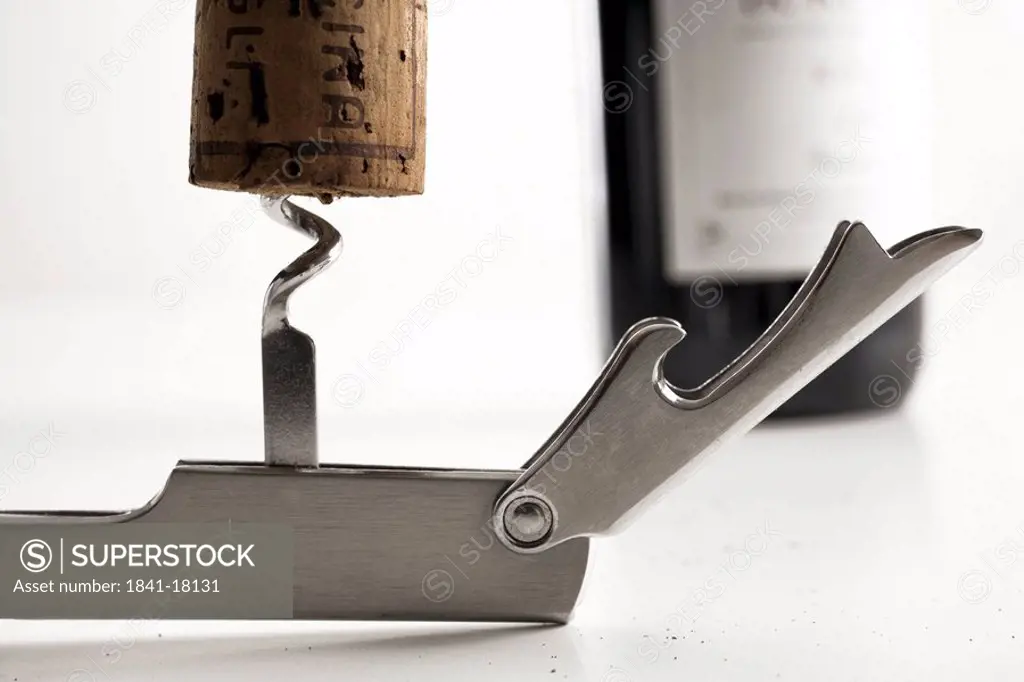 Close_up of cork and corkscrew