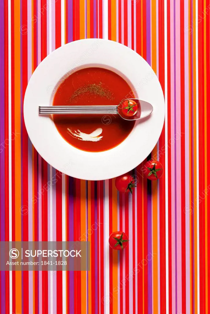 High angle view of tomatoes and a bowl of soup