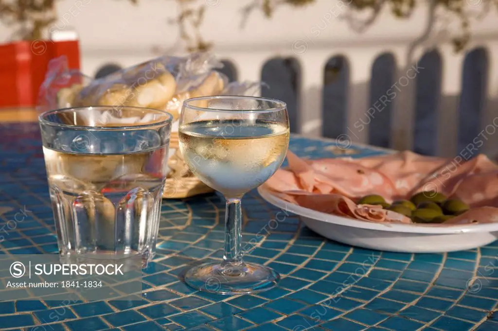 Close_up of snacks served on table, Italy