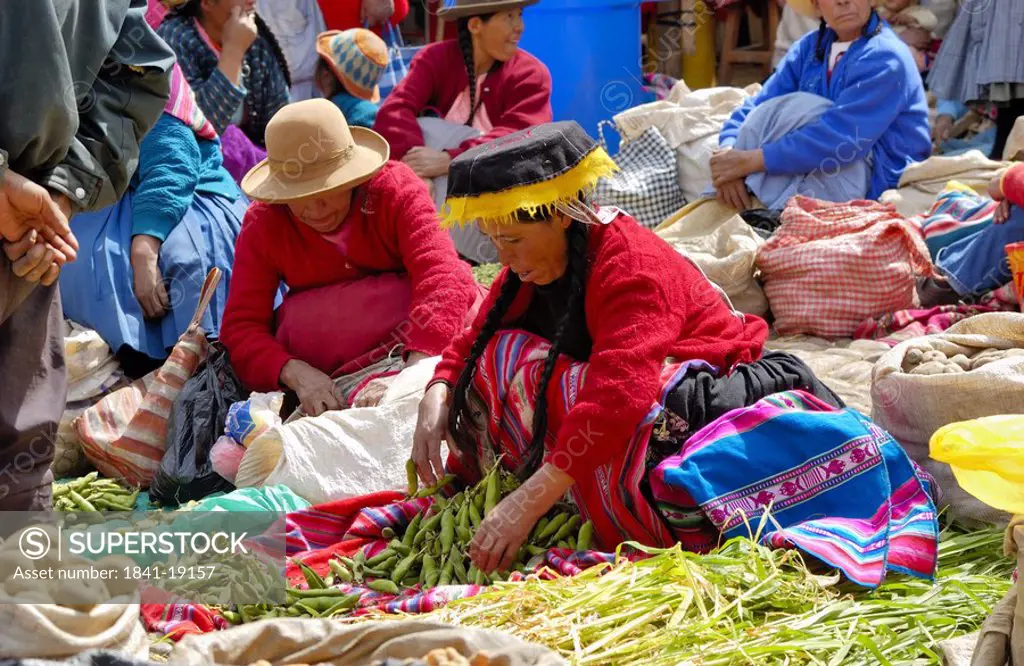 Female vendors in market, Pisac, Urubamba Valley, Peru