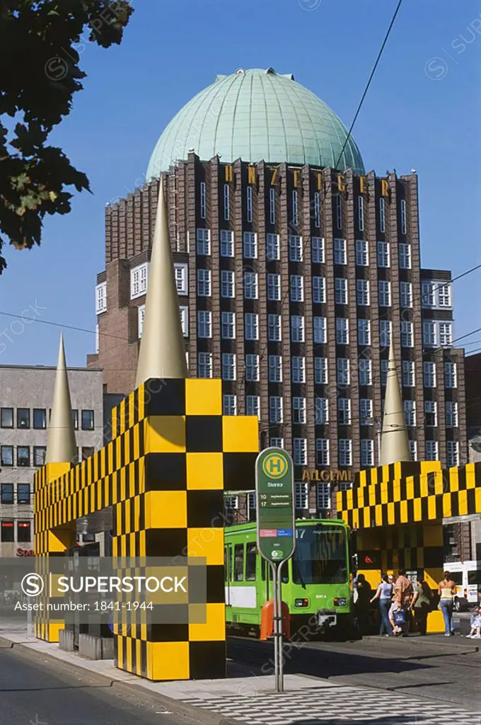 Tram on road in front of building, Anzeiger_Hochhaus, Hannover, Germany