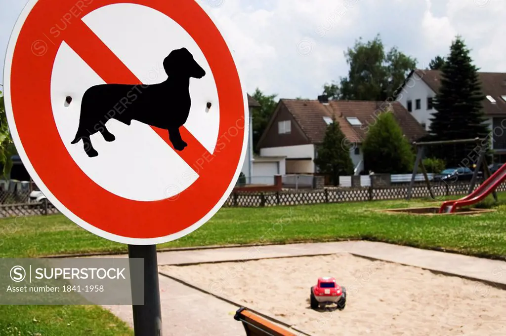 Sign dogs forbidden in front of a playground