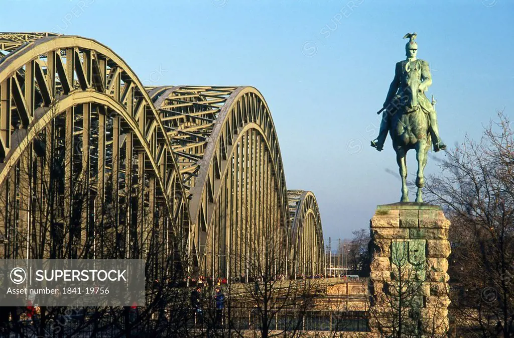 Statue in front of bride, Hohenzollern Bridge, Cologne, North Rhine_Westphalia, Germany