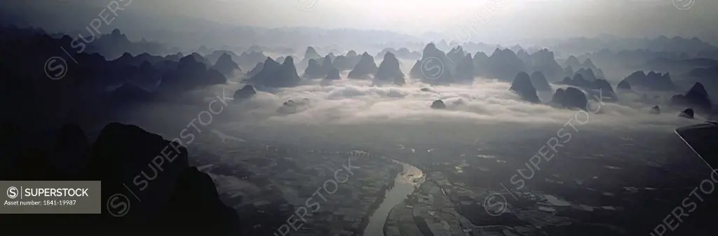 Aerial view of river flowing through landscape, China