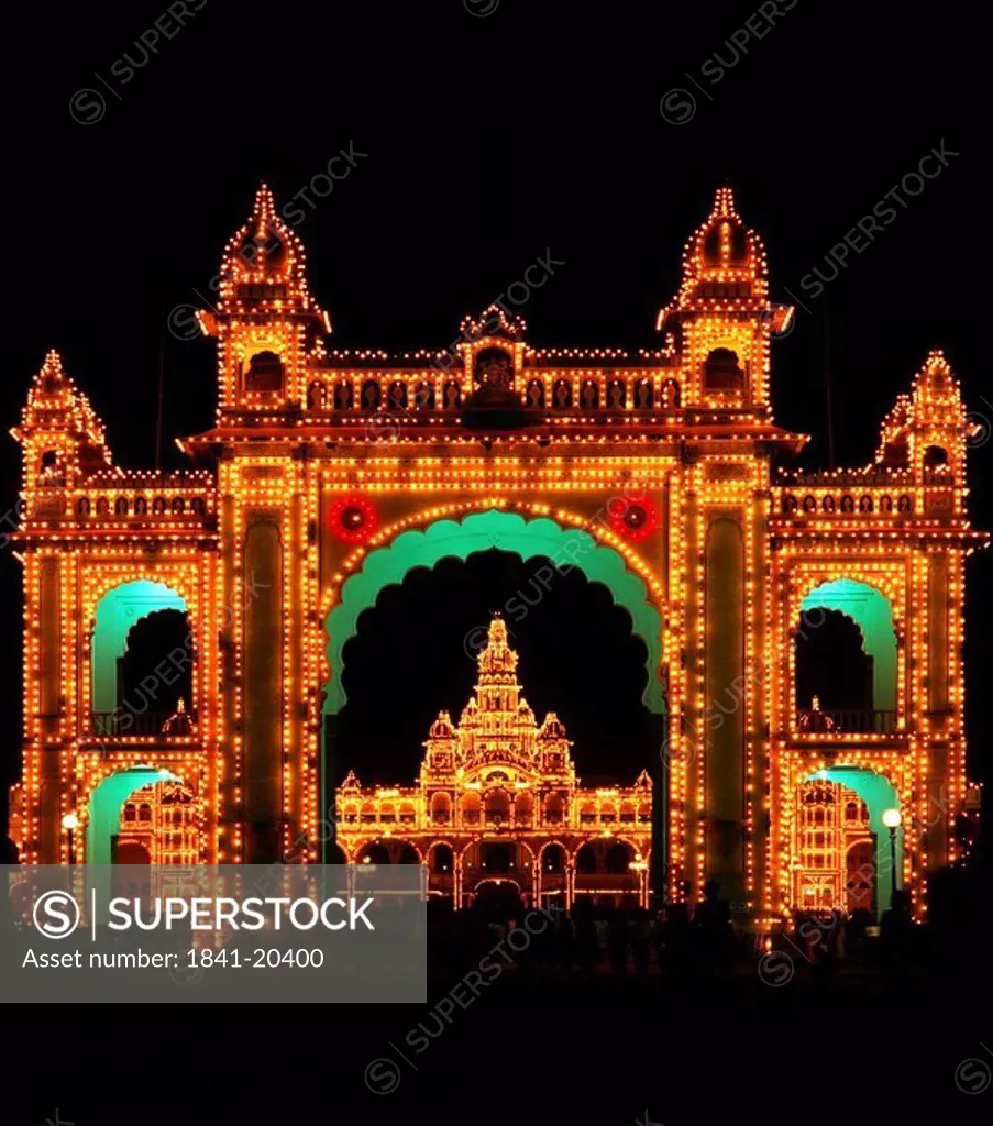 Facade of palace illuminated at night, Mysor Palace, Mysore, Karnataka, India, Asia